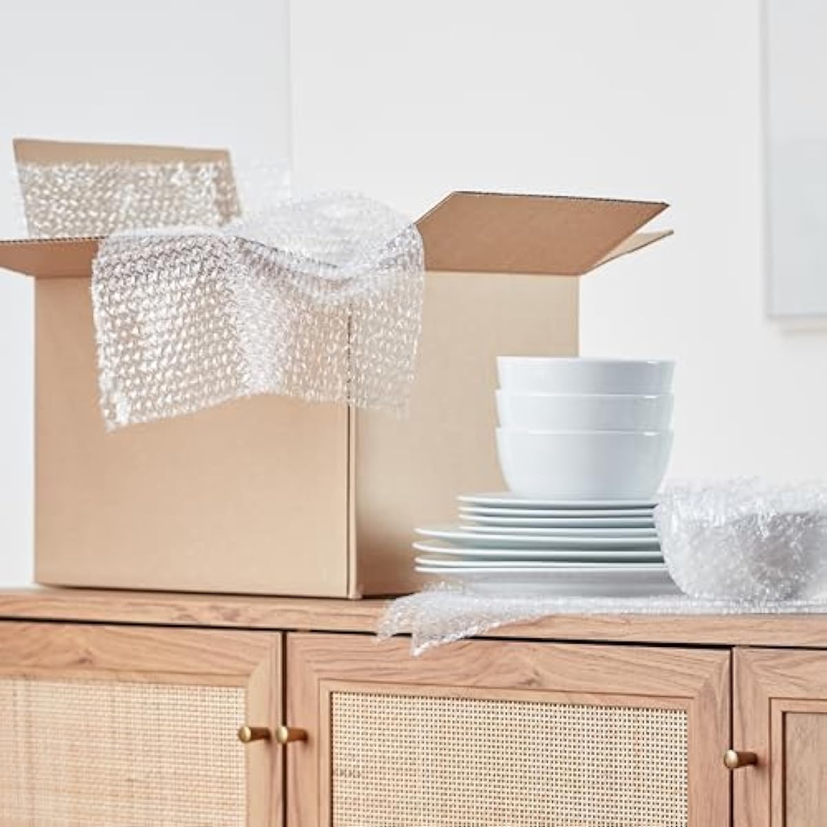 Amazon Basics Bubble Wrap for Moving, Packing, Shipping and Storage, Perforated Protective Cushioning for Fragile Items, 12-inch x 175-ft Long Roll, Small 3/16", Clear