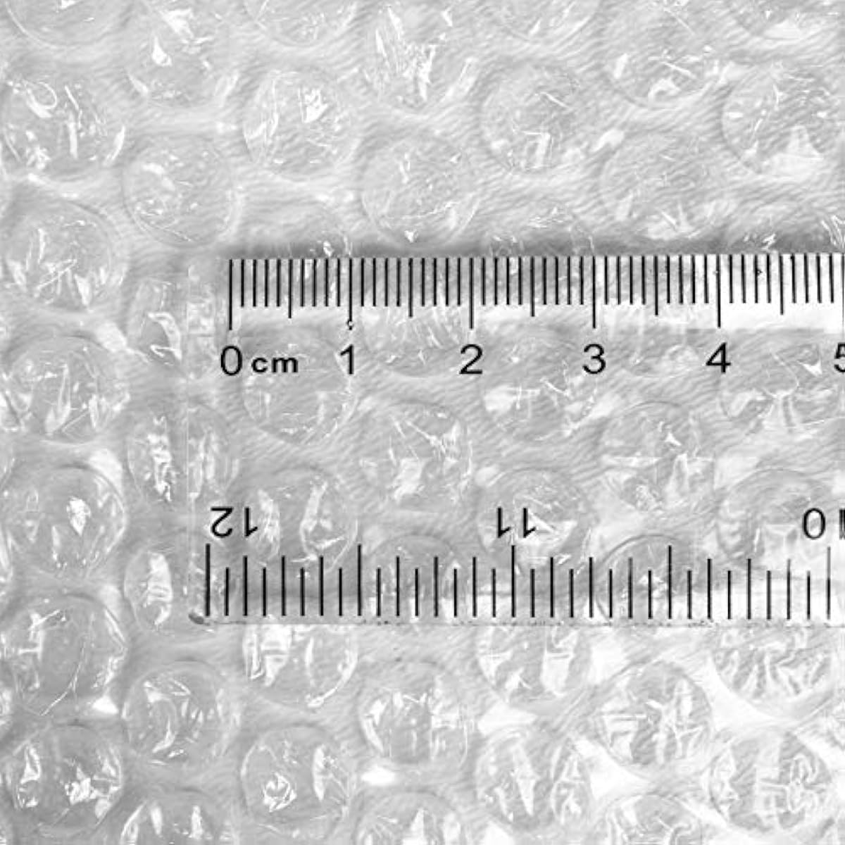 Amazon Basics Bubble Wrap for Moving, Packing, Shipping and Storage, Perforated Protective Cushioning for Fragile Items, 12-inch x 175-ft Long Roll, Small 3/16", Clear